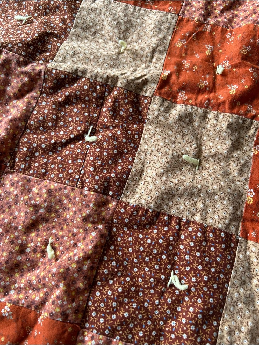 Handmade vintage. Rust & Brown Floral Patchwork Quilt